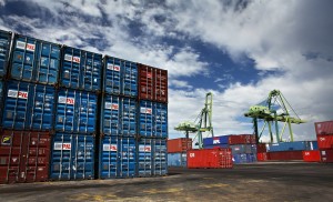 containers arriving  at the Brunei Container Port are being piled up.